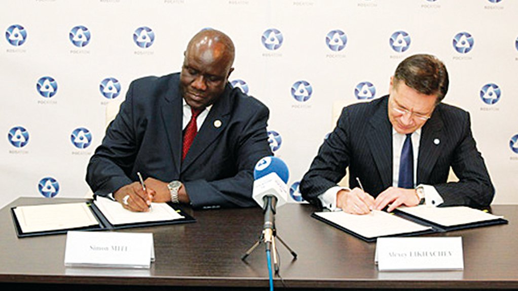 SIGNING ON Zambian Cabinet Office Permanent Secretary Simon Miti (left) and Rosatom CEO Alexey Likhachev sign the agreement to set up a Centre for Nuclear Science and Technology in Zambia