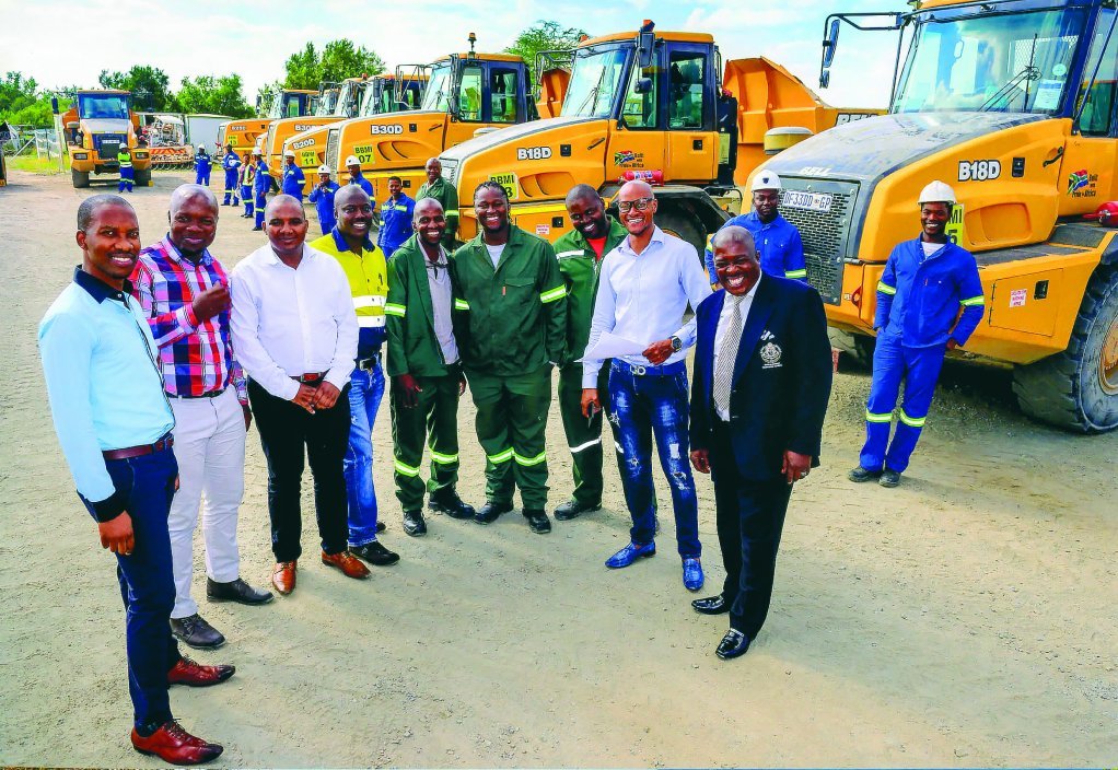 PROCUREMENT CONTRACT The Bapo Ba Mogale management team, on being awarded an equipment contract – a R225-million, five-year contract. The community was awarded four procurement contracts as part of its 2014 transaction with Lonmin