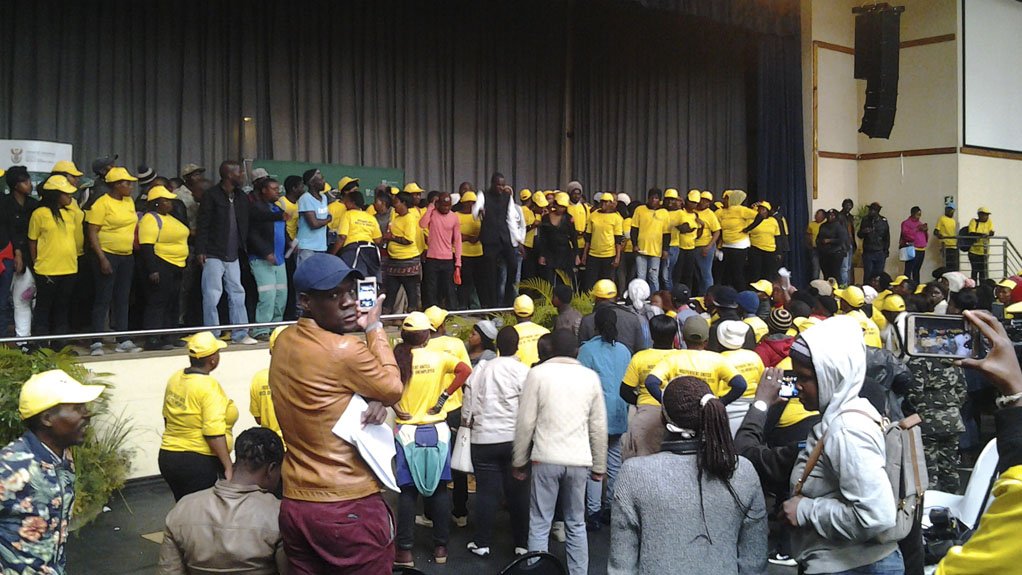 Practical Radical Economic Transformation members storm stage where Mineral Resources Minister Mosebenzi Zwane was meant to discuss the new Mining Charter
