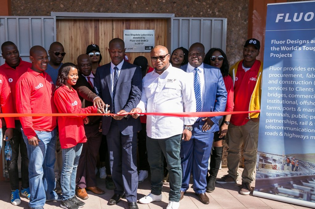 Fluor and SABC2 hand over refurbished science laboratory to Soweto school to celebrate Mandela Month.