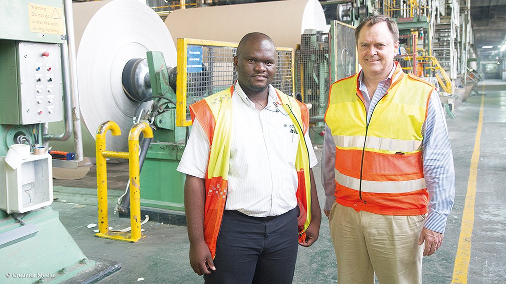 PROCESS MANAGERS Ensuring the pulp mill operates efficiently is manager Godfrey Zwane, who is flanked by recycling division MD John Hunt