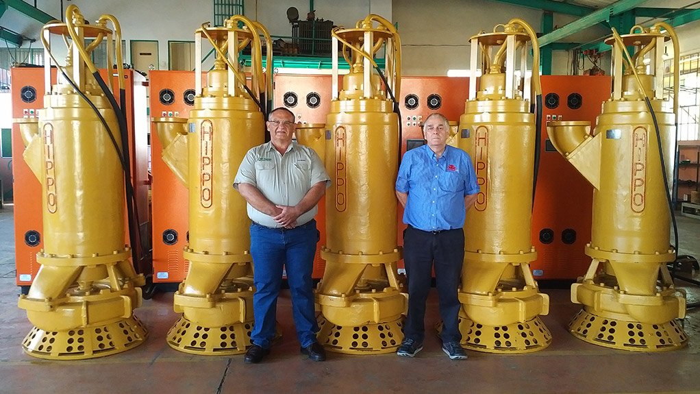 Mr. Chris Munnick from Carl Hamm PPS (Pty) Ltd and Mr. Pieter Swanepoel from Hazleton Pumps with the pumps for the Koidu Diamond Mine