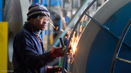 Steel manufacturer manages processing upgrades despite hostile industry 