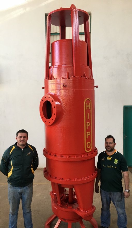PUMPING SOLUTION Marius Sunkel and Riaan Zowitsky flanking the world’s first Hippo Flameproof MVHV; High Head; High Volume Submersible Slurry Pump 