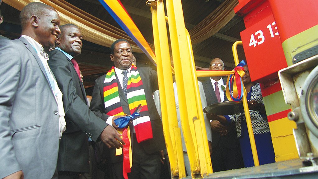 RECAPITALISATION PUSH Emmerson Mnangagwa (wearing scarf) officiates at the Transnet-DIDG consortium’s handover of locomotives, passenger coaches and wagons to the National Railways of Zimbabwe