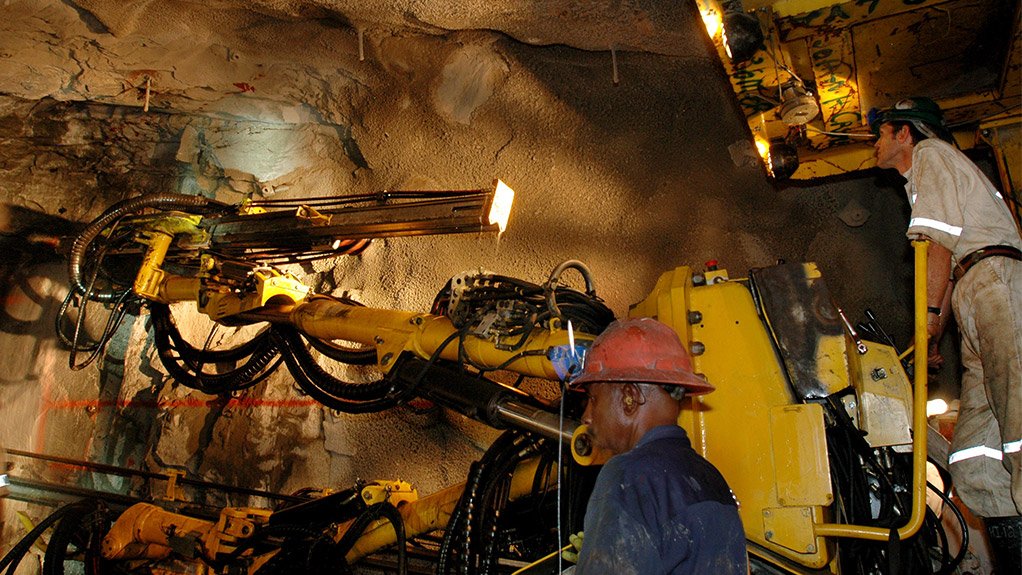 FLAGSHIP OPERATION A jumbo drill rig works under ground at Anglo Gold Ashanti's Mponeng gold mine near Carltonville, South Africa 