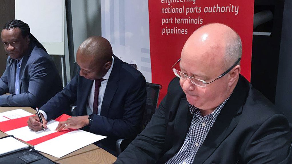 South32 South African manganese operations VP Lucas Msimanga, South32 commercial operations VP Kgabi Masia and Transnet new business chief officer Gert de Beer