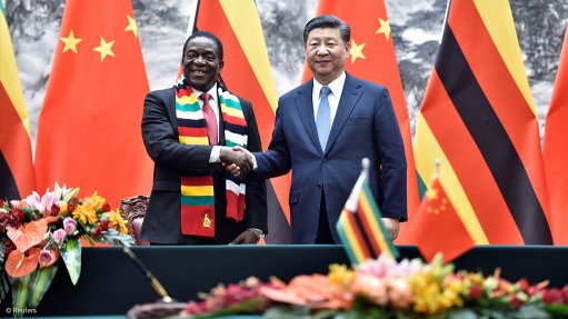 China's Xi tells Zimbabwe president they should write 