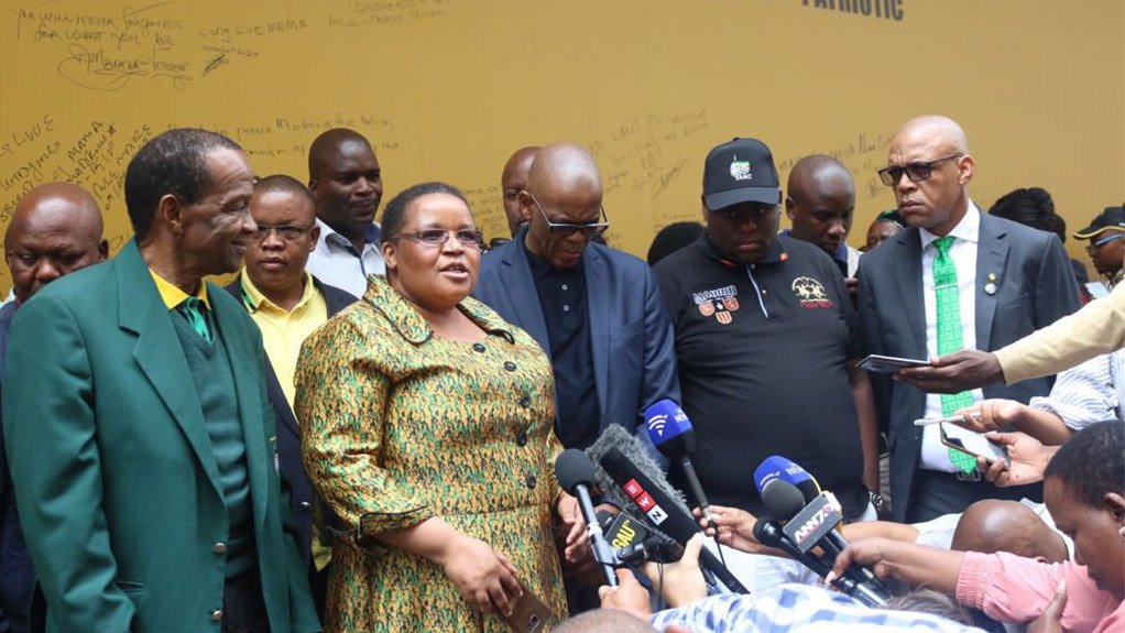 ANC members in front of the Winnie Madikizela-Mandela tribute wall