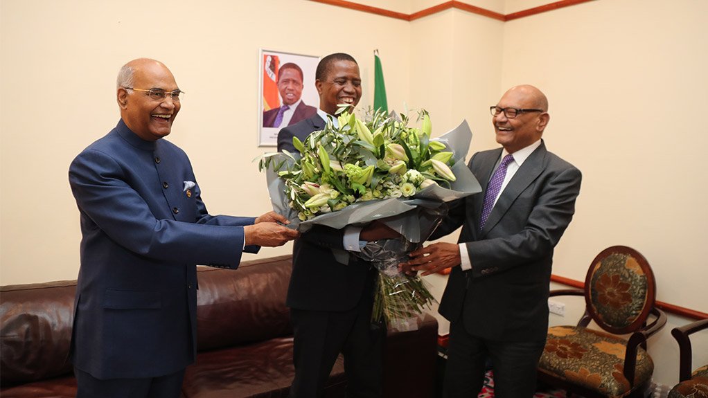 Vedanta Resources Chairperson Agarwal Presents a Bouquet to Zambian President Edgar Lungu at the Zambia-India Business Forum in Lusaka; Looking on is India President Ram Nath Kovind