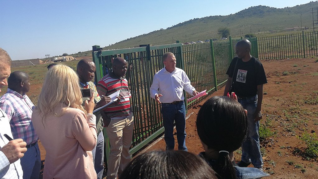 Advocate Gerrie Nel speaking to attendees and the community on Tuesday