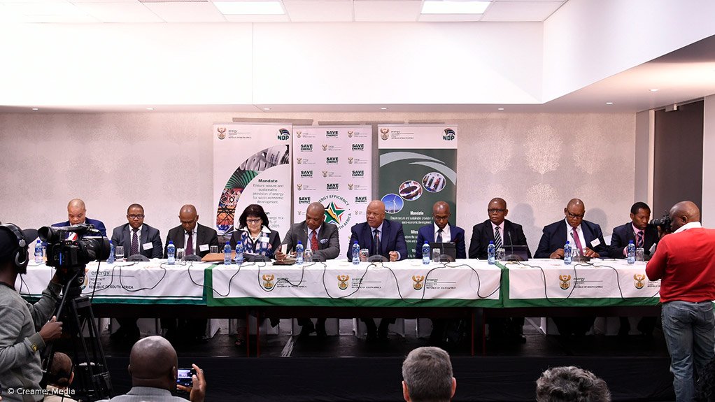 Energy Minister Jeff Radebe (centre) with his team at DoE