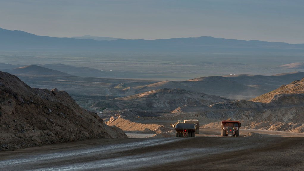 Trucks hauling ore at the Marigold mine, in Nevada.