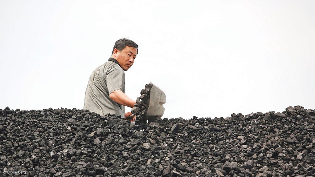NUMBER ONE An open pit coal face in a mine in Shanxi province. China is closing obsolete collieries and developing modern ones in their place