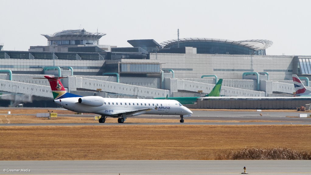 An Embraer ERJ-145 airliner of Airlink taxiing at ACSA’s OR Tambo International Airport 