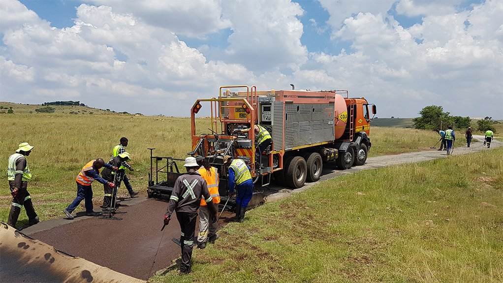 ENVIRONMENT-FRIENDLY The Colas South Africa team applying Colmat L microsurfacing in the Krugersdorp Nature Reserve 
