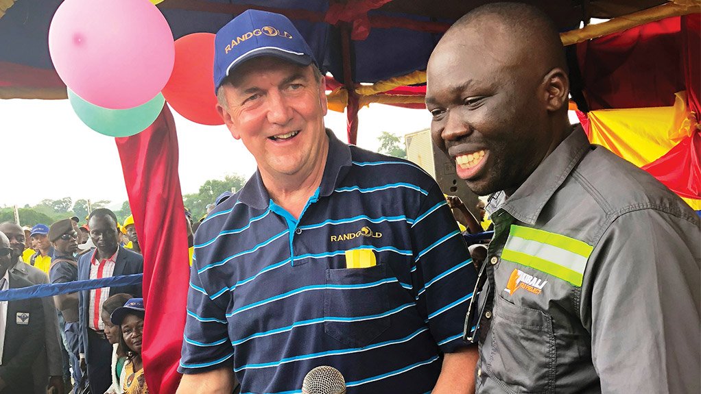 Randgold CEO Mark Bristow (left) with Inter Oriental Builders' Feni Matsando Samuel, who built the new hydropower plant on time and on budget with an all-Congolese team.