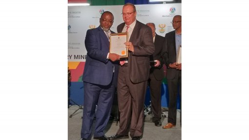 HEAPED WITH HONOURS
Pienaar was recognised for his long-standing service to health and safety in the mining industry 
