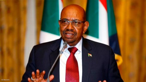 Sudan's Bashir vows to stay in power as protests rage nearby