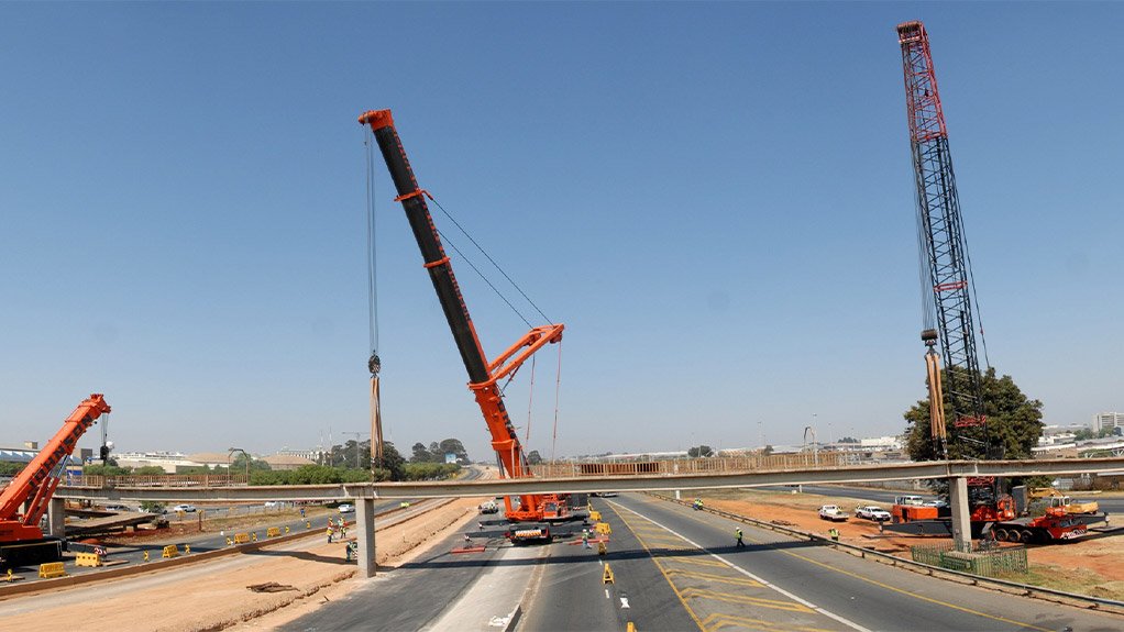 MULTIPLES A multiple crane lift for the removal of heavy existing bridge beams on the R21, in Gauteng, which was performed while the freeway was in operation 