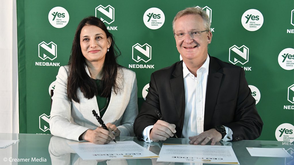 YES CEO Tashmia Ismail-Saville and Nedbank CEO Mike Brown sign the CEO pledge 