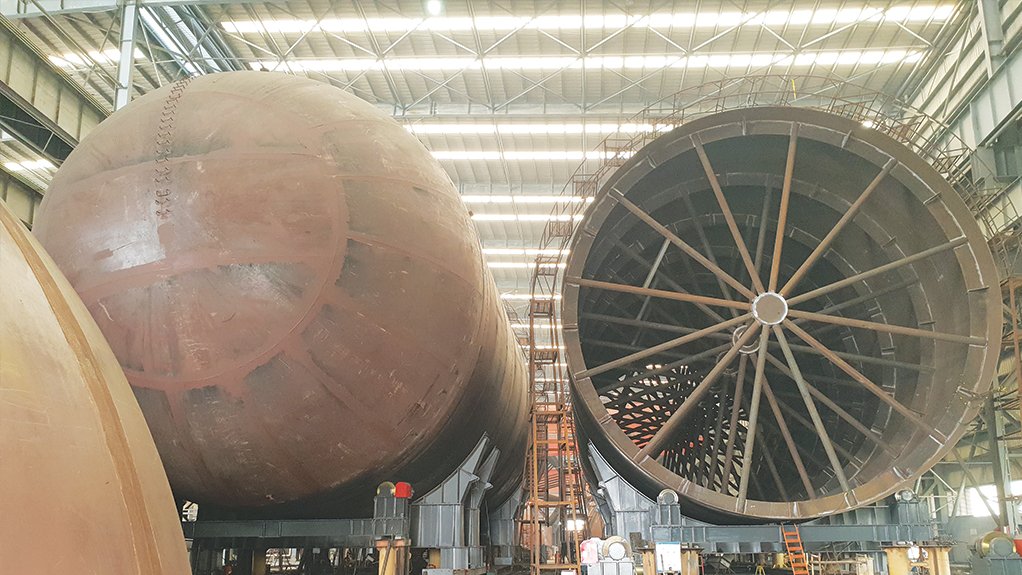 BALLS OF STEEL Two of the tanks being fabricated in Zhongshan, China – one with an end-cap fitted and the other without 