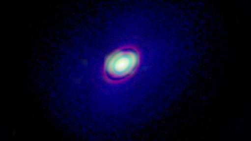 Rare molecule found in planet-forming disc for first time