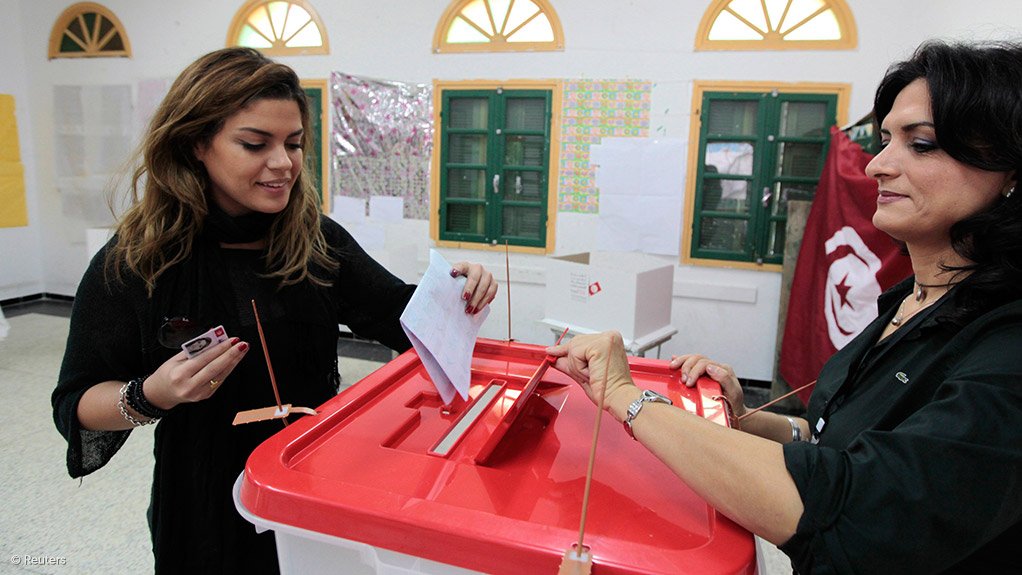 Tunisian establishment stunned as outsiders win presidency