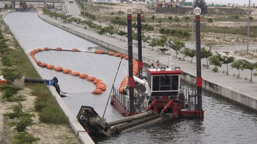 A customized IHC Beaver CSD in maintenance dredging operation, currently clearing a canal at a reclaimed marina in Lagos, Nigeria.