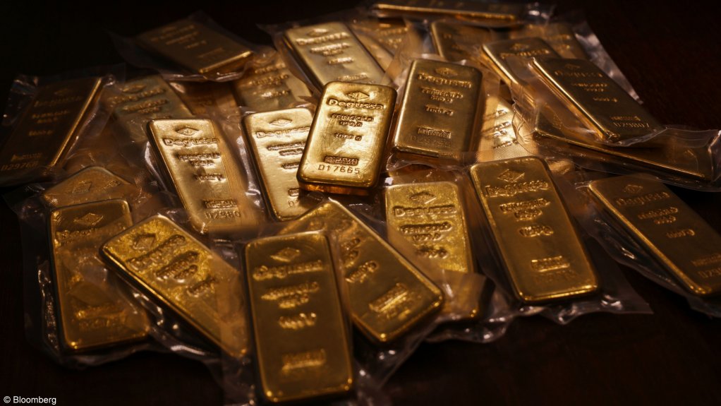 Gold parades haven status with rally to highest close since ‘13