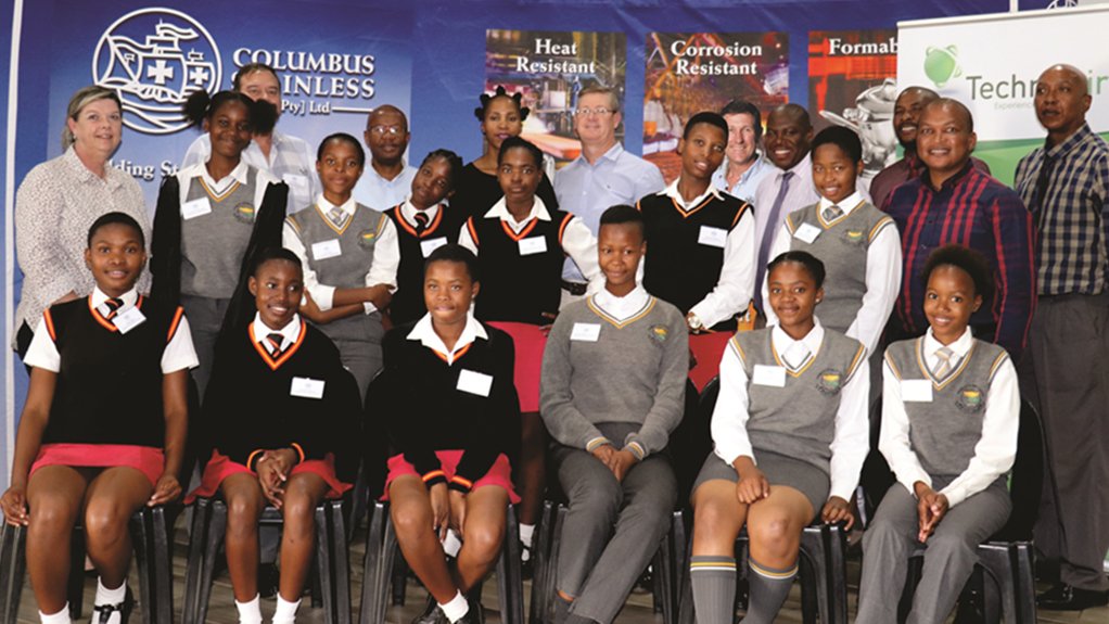 Back (left to right) : Andolene Hofmeyr (TechnoGirl Programme Manager), Piet Potgieter (Columbus Stainless General Manager - Finance) , Jo Mabhena (Columbus Stainless General Manager - HR), Kutala Bizana (Columbus Stainless General Manager – Legal & Transformation) , Johan Strydom (Columbus Stainless CEO), Bertus Griesel (Columbus Stainless General Manager – Commercial), Mpe Majeremane (Ekwazini Secondary School Principal), David Sebothoma (Phumelela Secondary School Acting Principal), Cllr Johan Matshiane (MMC for Social, Cultural & Sports Service), Daniel Makuse (Acting Circuit Manager), with the selected TechnoGirls.