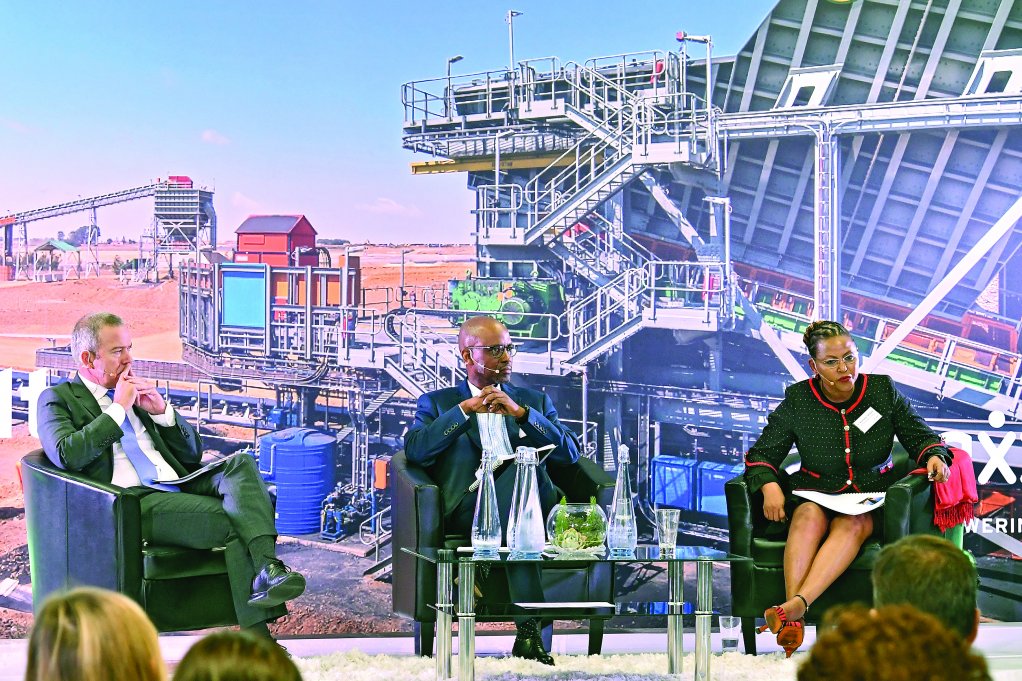 Exxaro CEO Mxolisi Mgojo (centre, flanked by executive head coal operations Nombasa Tsengwa (right) and finance director Riaan Koppeschaar (left).