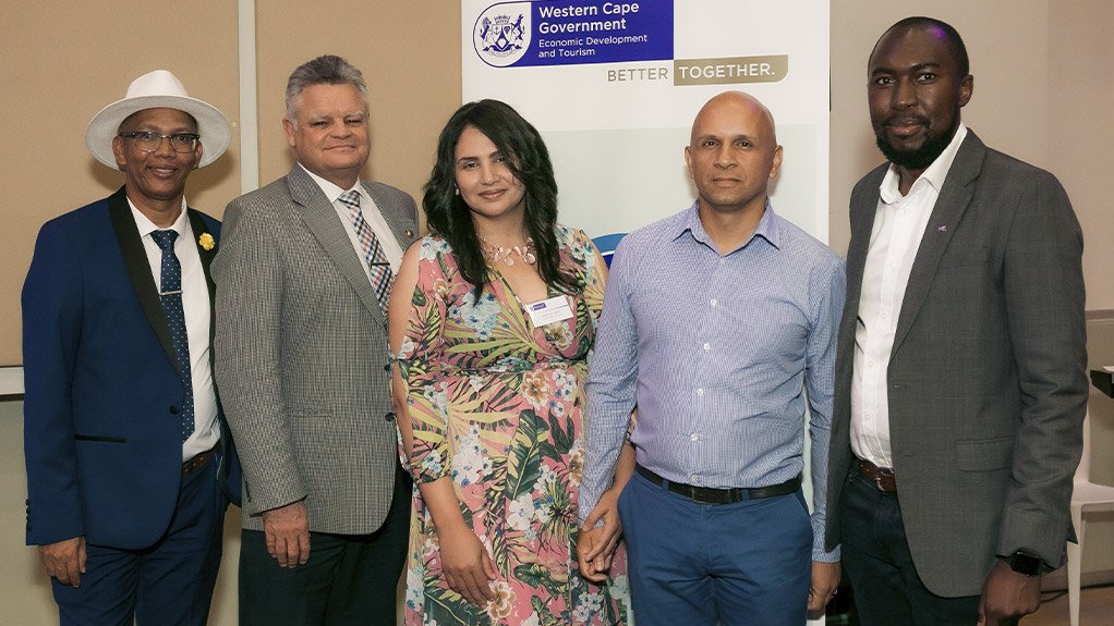 Left: Abraham Oliver, Reid, Western Cape Entrepreneurship Recognition Awards, the winner of the Women owned Business, Terine Lott Cupido (who is a past beneficiary of the CFE) With her is her husband, and next to her is Collen Dlamini of Future managers. 

