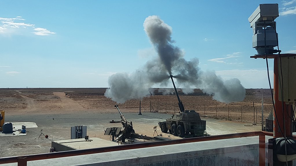 A Denel G6 155 mm self-propelled gun/howitzer fires an RDM shell using RDM propellant 