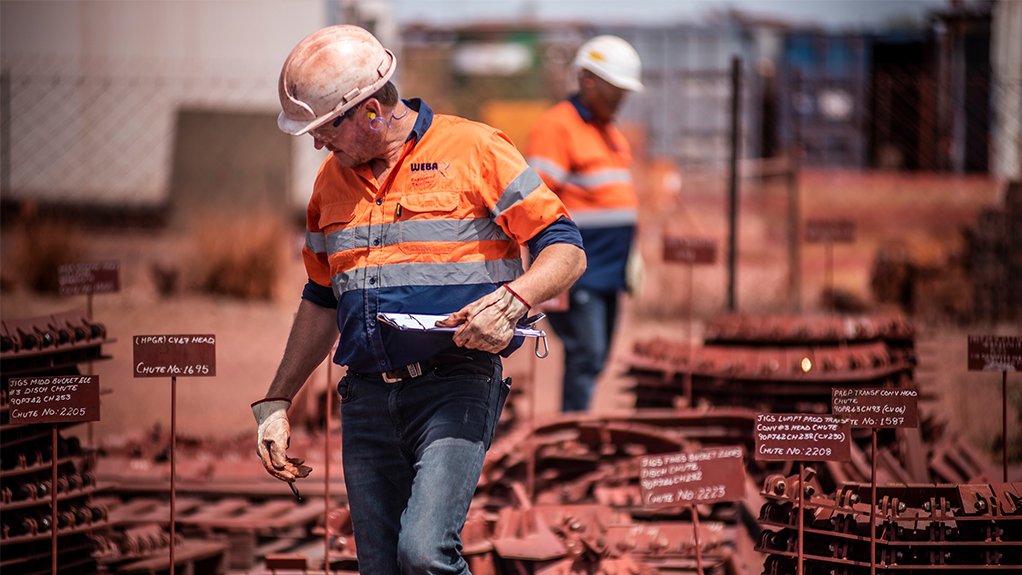 Weba Chute Systems team on site keeping a customer’s stock yard organised. 