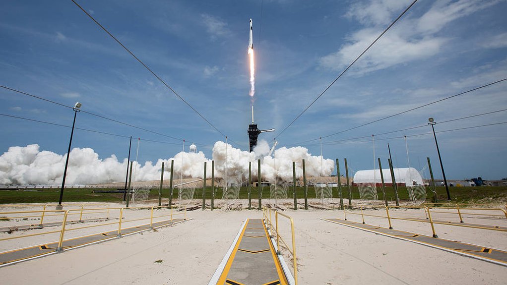 The Falcon 9 rocket carrying the Crew Dragon spacecraft lifts off from KSC on May 30. 