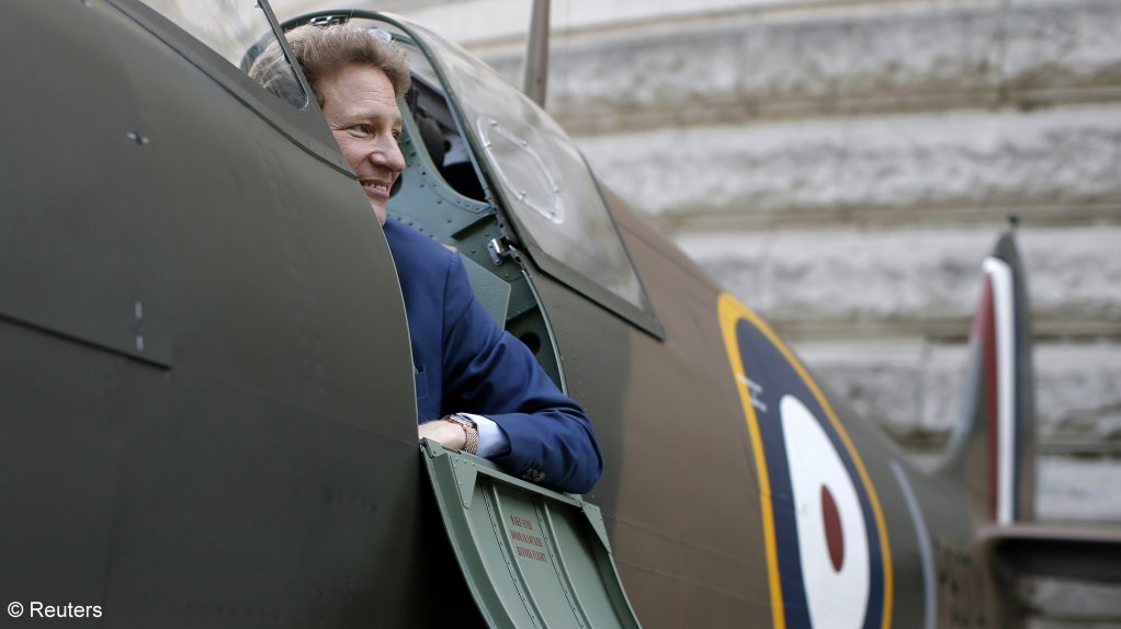 Thomas Kaplan sits in a Mk 1 Spitfire on display in London.