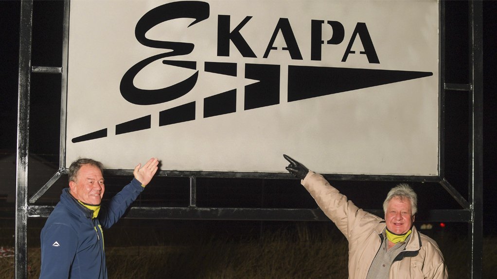 Ekapa's Jahn Hohne and Peter Hohne stand in front of the newly renamed mine sign