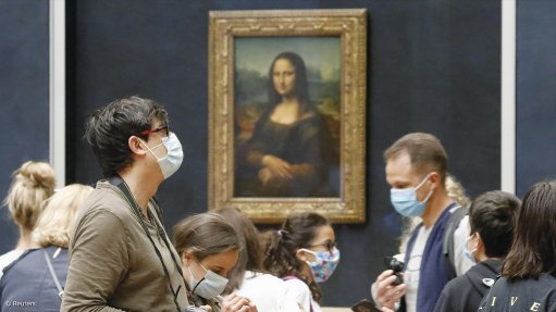ART OF REOPENING: The Louvre museum, in Paris, has reopened its doors to the public after an almost four-month closure, owing to the coronavirus outbreak in France. There is something of an art to the reopening of the world’s busiest museum during a pandemic, though. All visitors are now expected to wear protective face masks and an online reservation system is being use to limit crowds to well below the typical 50000-a-day pre-pandemic visitor numbers. The upside is that visitors, such as those pictured here, are now able to have a less congested experience when viewing the museum’s most famous painting, the Mona Lisa, by Leonardo Da Vinci. Photograph: Charles Platiau for Reuters
