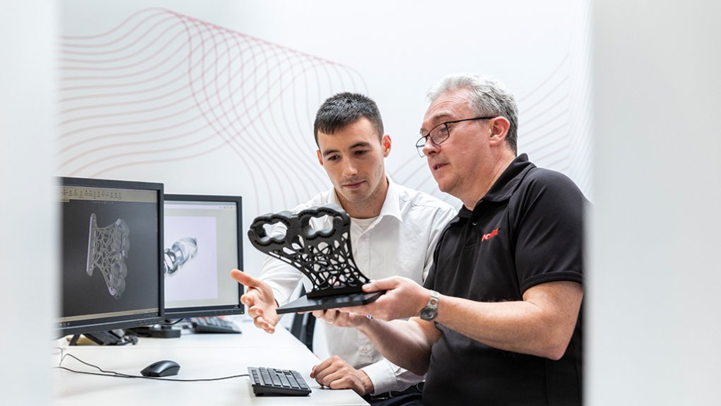 A Henkel engineer working with a customer to optimise a 3D printed part