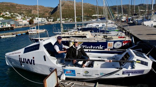 juwi MD Greg Austin and juwi economic development manager Zirk Botha with the boat Botha will row across the Atlantic ocean