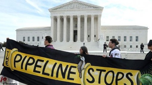Demonstrators protest against the Atlantic Coast pipeline in front of the US Supreme Court in Washington, D.C.