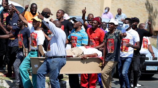 Cape Town undertakers place coffins on N2 as funeral industry shutdown continues