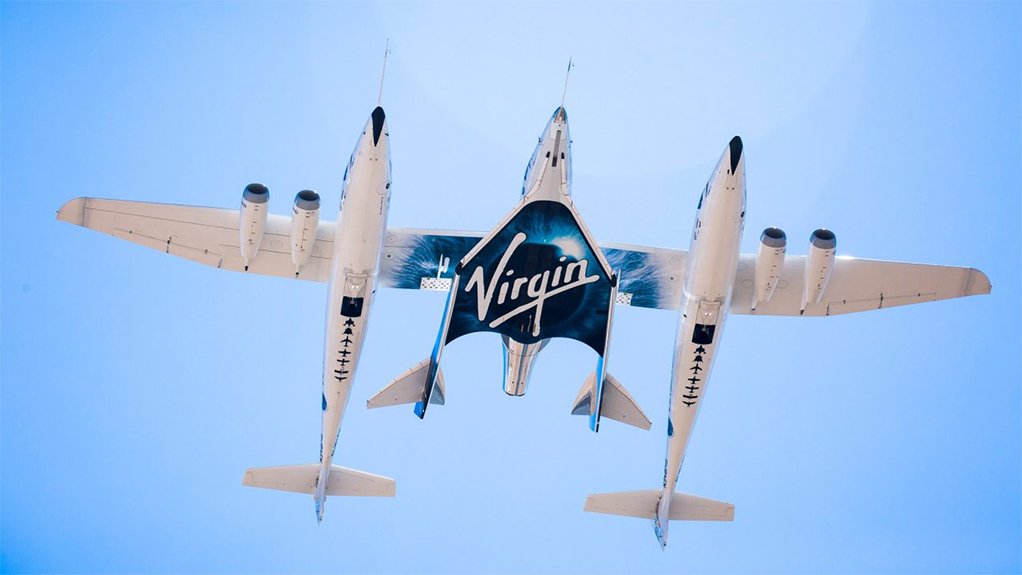 A view from below of WhiteKnightTwo carrying SpaceShipTwo beneath its wing centre section