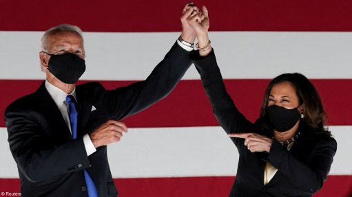 Former Vice President Joe Biden and US Senator and Democratic candidate for Vice President Kamala Harris celebrate.