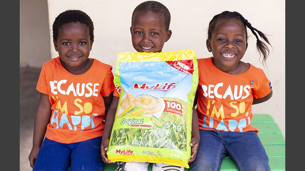 Pictured with a 5kg bag of My Life porridge are from left: Bongomusa Dlamini, Esihle Majola, Kuhlekonke Khubo from Luthando Day Care, Dassenhoek
