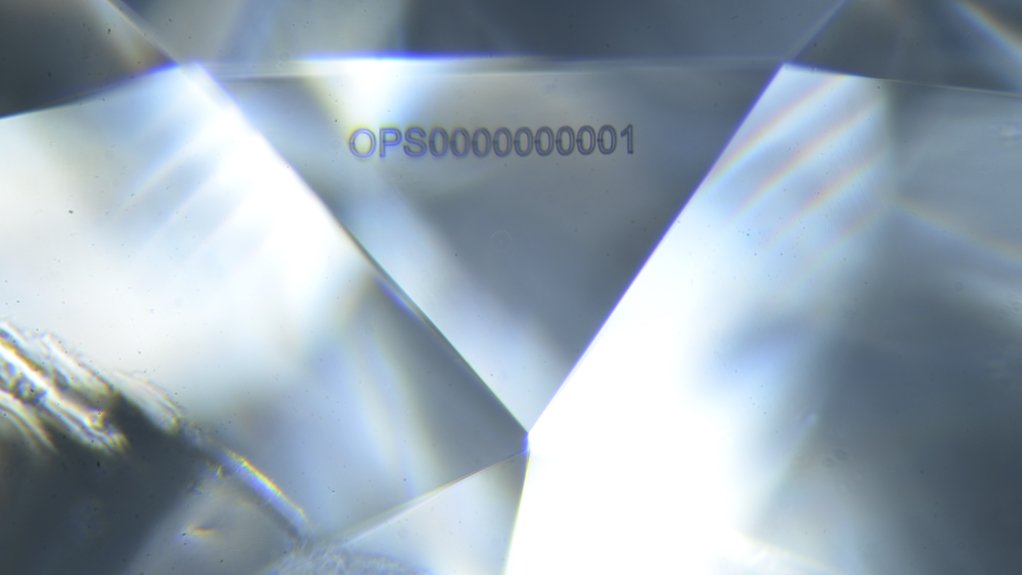 A typical marking on a diamond made by the Opsydia system