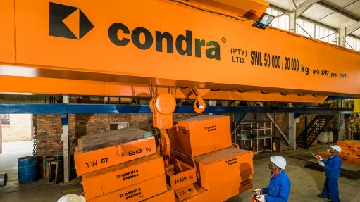 A 50/20-ton Condra crane similar in aspect to the much bigger machine just ordered for the moving and positioning of injection moulding heads.