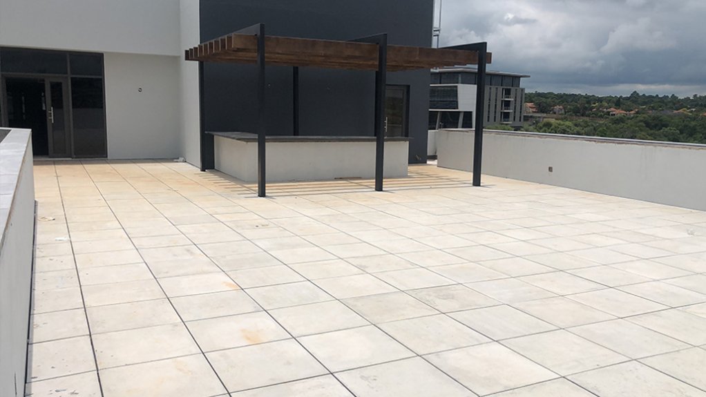 The completed InstaCradle raised paving area on the third-floor balcony of the new building in Centurion.