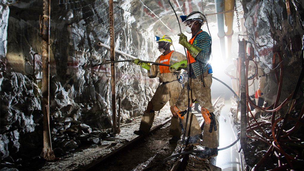Harmony Gold mineworkers underground at Masimong gold mine.
